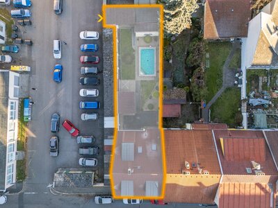 Prodej cihlového činžovního  domu s garáží, zahradou a skvělou polohou v Komenského ulici.